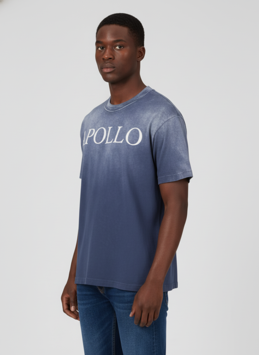 Man wearing a blue t-shirt with 'APOLLO' text on a white background